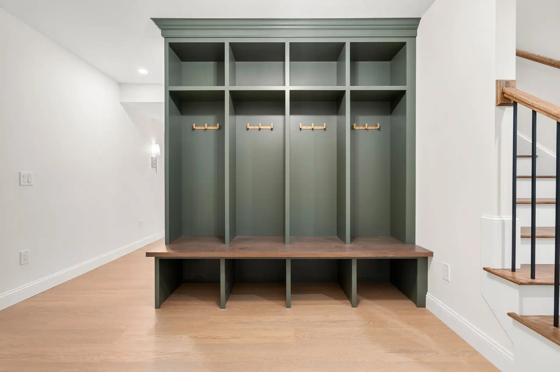 Photo of Built-in storage spaces in a finished basement.