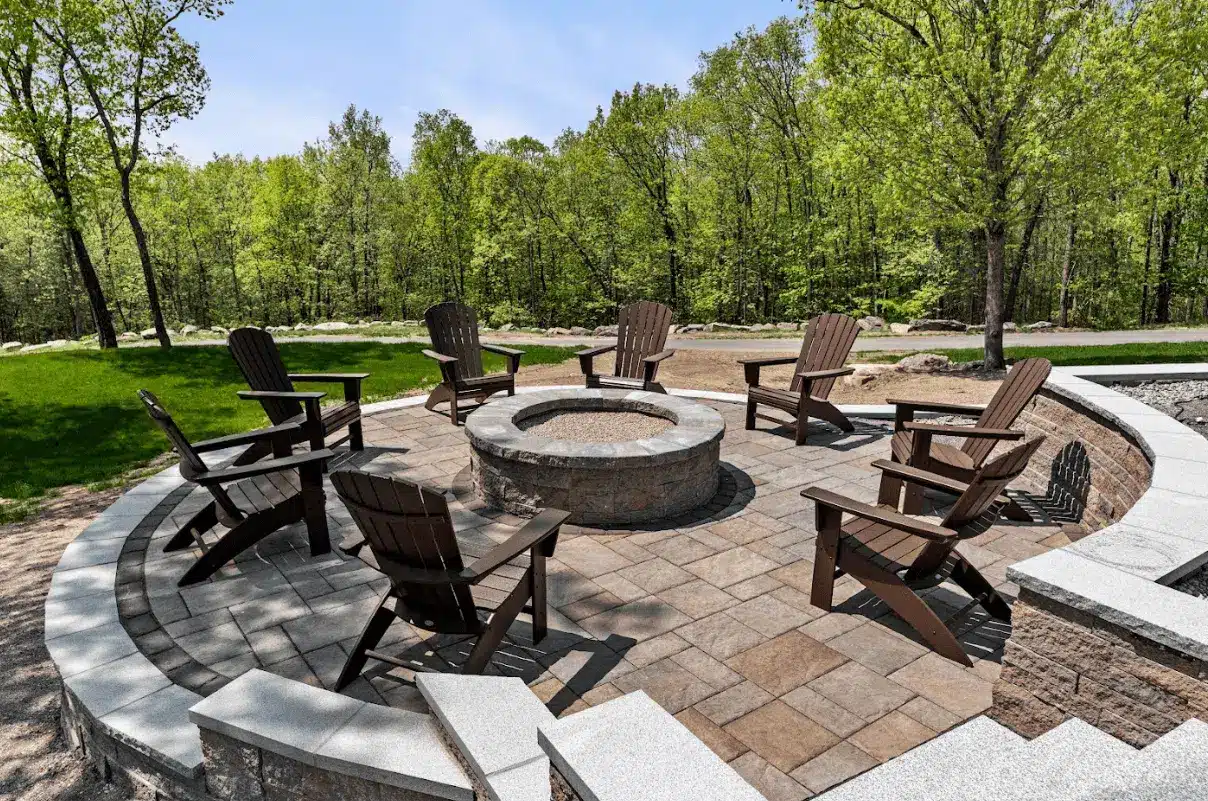 fire pit on a patio with an entertainment area and an elevated deck - patio fire pit builders near me - Outdoor fireplaces contractors NH