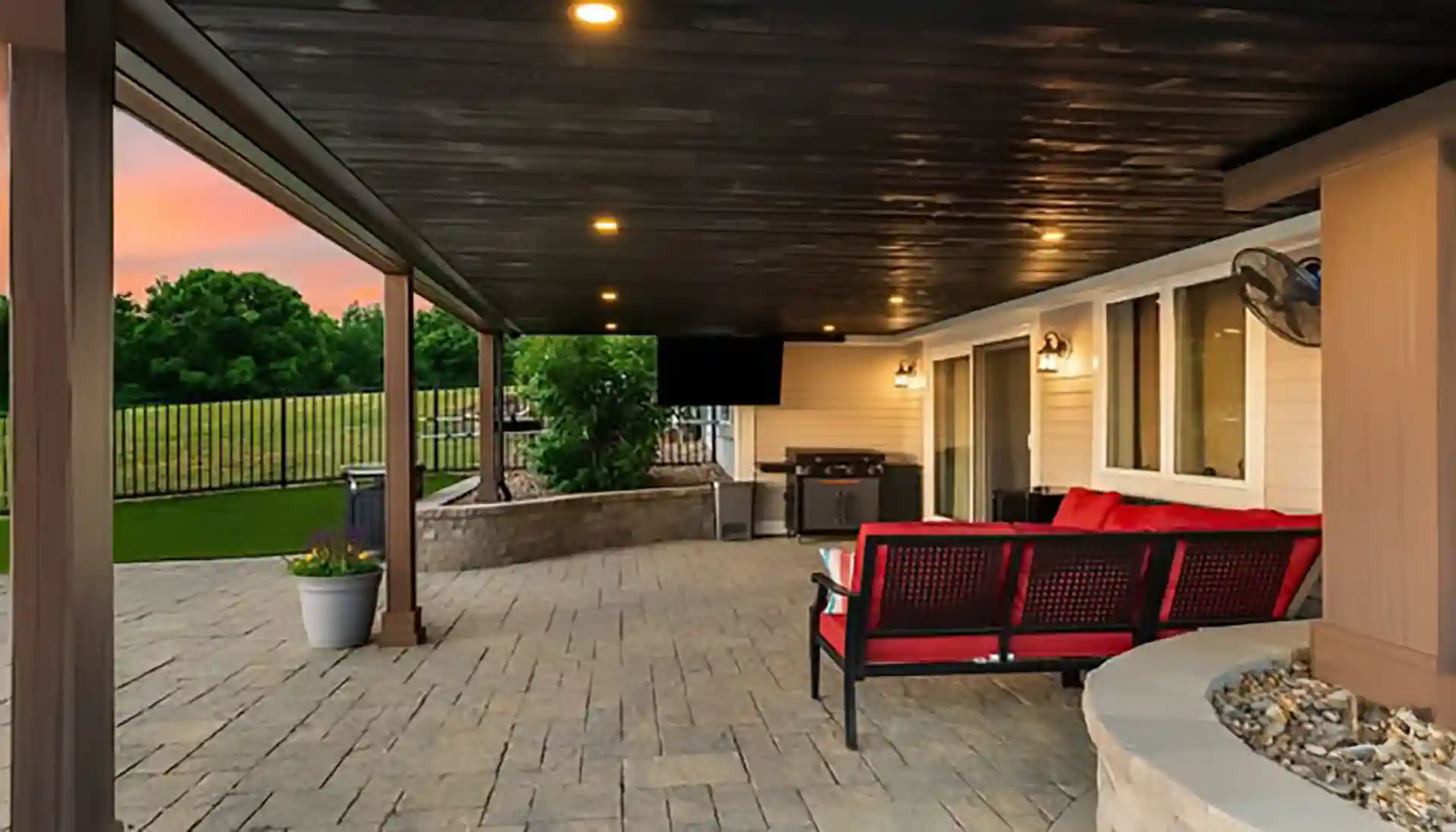 photo of a dry space under deck that allows for a patio and grilling station - Benefits of Dry Space Under Deck Systems - Deck Waterproofing Services near me in New Hampshire